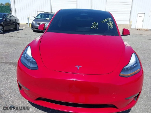 2023 Tesla Model Y Long Range with VIN 7SAYGDEE0PA094810, listed as a IAAI auction lot 41998312 with 10,376 mi miles. Bid and sale history available at carsss.com. Image 6.