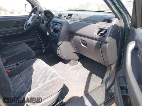 1999 Honda CR-V EX with VIN JHLRD1866XC028200, listed as a IAAI auction lot 42040657 with 207,397 mi miles. Bid and sale history available at carsss.com. Image 5.