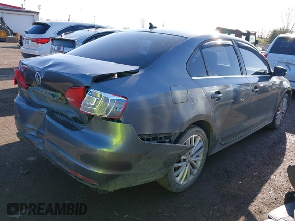 2014 Volkswagen Jetta TDI w/Premium with VIN 3VW3L7AJ9EM383295, listed as a IAAI auction lot 41983218 with 105,077 mi miles and . Bid and sale history available at DreamBid. Image 4.