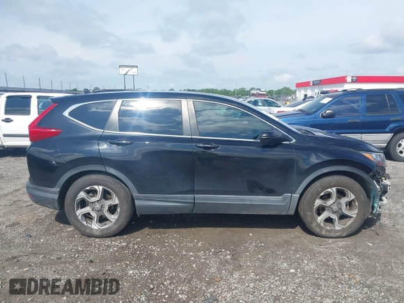 2018 Honda CR-V EX with VIN 7FARW1H59JE001943, listed as a IAAI auction lot 42123180 with 72,451 mi miles and . Bid and sale history available at carsss.com. Image 14.