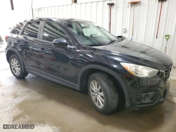 2016 Mazda CX-5 Touring with VIN JM3KE4CY3G0655581, listed as a Copart auction lot 49452455 with 175,233 mi miles and Salvage Title. Bid and sale history available at carsss.com. Image 4.