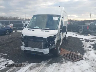 2023 Ford Transit Cargo with VIN 1FTBW1X83PKC09336, listed as a IAAI auction lot 41299101 with 10,551 mi miles and . Bid and sale history available at DreamBid. Image 12.