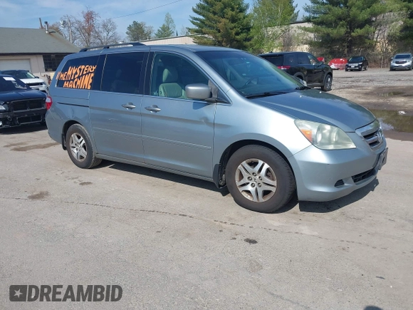 2006 Honda Odyssey EX-L with VIN 5FNRL38656B120539, listed as a IAAI auction lot 42190857 with 242,152 mi miles. Bid and sale history available at carsss.com. Image 1.