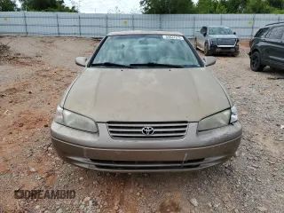 1999 Toyota Camry LE z VIN JT2BF28K9X0199531, wystawiony jako Copart lot #55637275 z przebiegiem Nie podano mil oraz Szkoda całkowita • Salvage title. Historia ofert i sprzedaży dostępna na DreamBid. Obrazek 5.