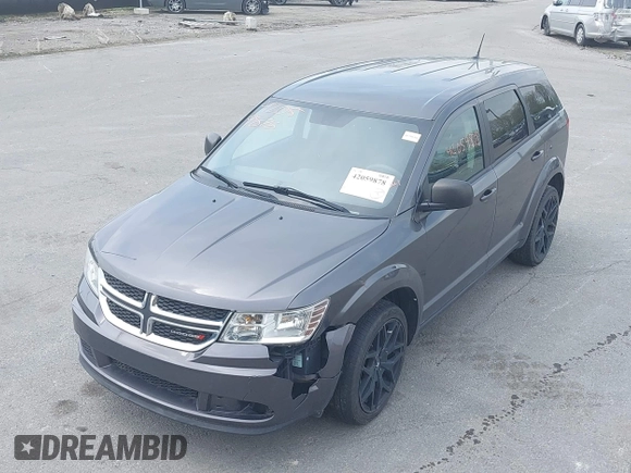 2015 Dodge Journey SE z VIN 3C4PDCAB4FT675074, wystawiony jako IAAI lot #42059878 z przebiegiem 99 947 mil mil oraz . Historia ofert i sprzedaży dostępna na DreamBid. Obrazek 12.