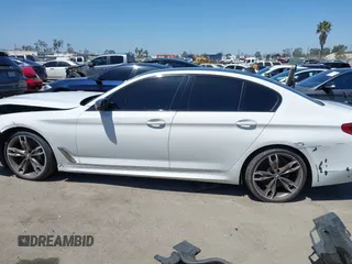 2020 BMW 5 Series M550i xDrive with VIN WBAJS7C0XLCD42738, listed as a IAAI auction lot 42326945 with 50,046 mi miles and . Bid and sale history available at DreamBid. Image 14.