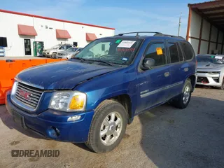 2006 GMC Envoy SLE with VIN 1GKDS13SX62315193, listed as a IAAI auction lot 41866029 with 231,164 mi miles. Bid and sale history available at carsss.com. Image 6.