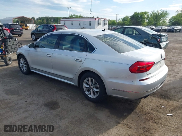 2016 Volkswagen Passat S with VIN 1VWAT7A39GC014305, listed as a IAAI auction lot 42144322 with 187,419 mi miles and . Bid and sale history available at DreamBid. Image 3.