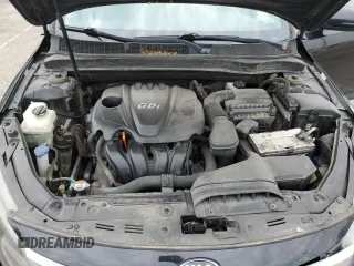 2013 Kia Optima LX z VIN 5XXGM4A73DG236538, wystawiony jako Copart lot #54799965 z przebiegiem 176 640 mil mil oraz Szkoda całkowita • Salvage title. Historia ofert i sprzedaży dostępna na DreamBid. Obrazek 11.