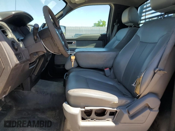 2011 Ford F-150 XL with VIN 1FTNF1CF2BKD62980, listed as a Copart auction lot 54854855 with 257,233 mi miles and Salvage title. Bid and sale history available at DreamBid. Image 7.