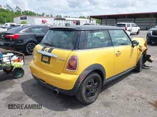 2009 MINI Hardtop with VIN WMWMF33579TT69729, listed as a IAAI auction lot 42116873 with 92,334 mi miles and . Bid and sale history available at DreamBid. Image 4.