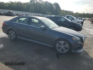 2014 Mercedes-Benz E 350 Sport with VIN WDDHF5KB3EA841153, listed as a Copart auction lot 55560935 with 211,504 mi miles and Clean Title. Bid and sale history available at DreamBid. Image 4.