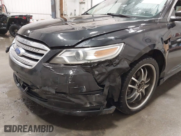 2011 Ford Taurus SEL with VIN 1FAHP2EW4BG160633, listed as a IAAI auction lot 41778406 with 125,934 mi miles. Bid and sale history available at carsss.com. Image 6.
