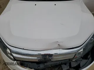 2010 Ford Fusion SE z VIN 3FAHP0HA0AR335424, wystawiony jako Copart lot #58853845 z przebiegiem 168 793 mil mil oraz Szkoda całkowita • Salvage title. Historia ofert i sprzedaży dostępna na DreamBid. Obrazek 11.