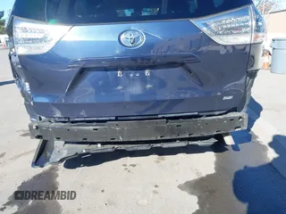 2018 Toyota Sienna SE with VIN 5TDXZ3DC8JS950681, listed as a IAAI auction lot 41389662 with 112,661 mi miles and . Bid and sale history available at DreamBid. Image 6.