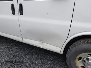 2013 Chevrolet Express Cargo with VIN 1GCWGFCA1D1162572, listed as a IAAI auction lot 42095786 with 242,248 mi miles and . Bid and sale history available at DreamBid. Image 6.