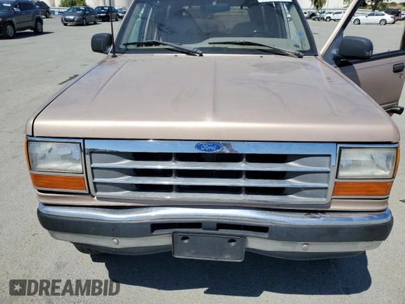 1993 Ford Explorer Eddie Bauer with VIN 1FMDU34X3PUA92606, listed as a Copart auction lot 57672895 with 72,606 mi miles and Salvage title. Bid and sale history available at DreamBid. Image 12.