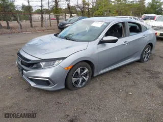 2019 Honda Civic Sedan LX with VIN 2HGFC2F65KH586106, listed as a IAAI auction lot 40486735 with 82,714 mi miles. Bid and sale history available at carsss.com. Image 6.