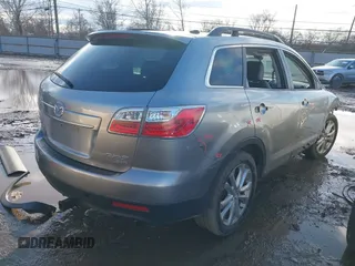 2011 Mazda CX-9 Grand Touring with VIN JM3TB3DV1B0302986, listed as a IAAI auction lot 41500223 with 156,244 mi miles. Bid and sale history available at carsss.com. Image 4.