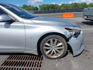 2014 Infiniti Q50 с VIN JN1BV7AP8EM691795, выставлен на аукционе IAAI как лот 42526313 с пробегом 112 407 миль миль и . История ставок и продаж доступна на DreamBid. Изображение 13.
