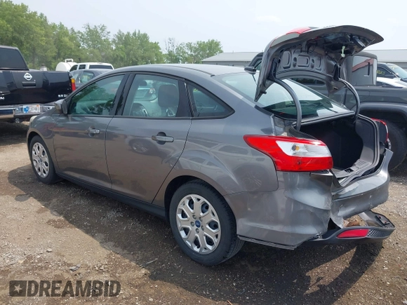 2012 Ford Focus SE with VIN 1FAHP3F26CL186645, listed as a IAAI auction lot 42458819 with 99,470 mi miles and . Bid and sale history available at DreamBid. Image 3.