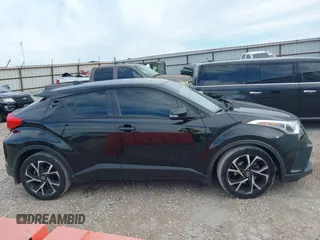 2018 Toyota C-HR XLE z VIN NMTKHMBX8JR008430, wystawiony jako IAAI lot #42635658 z przebiegiem 176 462 mil mil oraz . Historia ofert i sprzedaży dostępna na DreamBid. Obrazek 13.