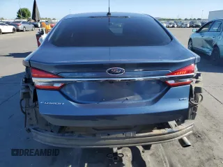 2018 Ford Fusion SE z VIN 3FA6P0H7XJR110391, wystawiony jako Copart lot #58069735 z przebiegiem 168 222 mil mil oraz Szkoda całkowita • Salvage title. Historia ofert i sprzedaży dostępna na DreamBid. Obrazek 6.