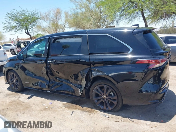 2021 Toyota Sienna XSE with VIN 5TDXRKEC6MS021909, listed as a IAAI auction lot 42432609 with 57,295 mi miles and . Bid and sale history available at DreamBid. Image 14.