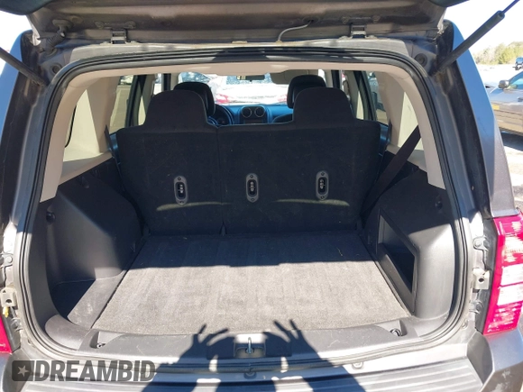 2014 Jeep Patriot Latitude with VIN 1C4NJRFB3ED886007, listed as a IAAI auction lot 41285963 with 127,007 mi miles and . Bid and sale history available at DreamBid. Image 8.