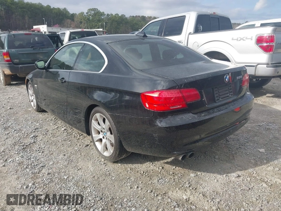 2011 BMW 3 Series 328i xDrive with VIN WBAKF5C52BE586375, listed as a IAAI auction lot 41799526 with 175,314 mi miles. Bid and sale history available at carsss.com. Image 3.
