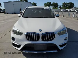 2019 BMW X1 xDrive28i with VIN WBXHT3C53K5L35670, listed as a Copart auction lot 53493245 with 14,201 mi miles and Salvage Title. Bid and sale history available at carsss.com. Image 5.