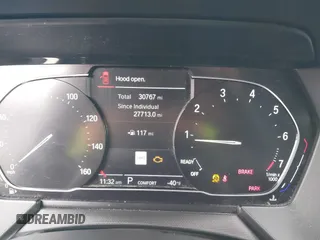 2021 BMW 2 Series 228i xDrive with VIN WBA73AK0XM7H43867, listed as a IAAI auction lot 41226556 with 30,767 mi miles and . Bid and sale history available at DreamBid. Image 7.