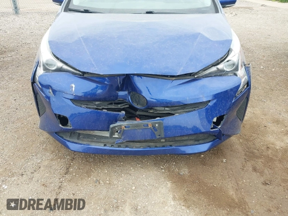 2016 Toyota Prius Two z VIN JTDKBRFU3G3511809, wystawiony jako IAAI lot #42295946 z przebiegiem 118 621 mil mil oraz . Historia ofert i sprzedaży dostępna na DreamBid. Obrazek 6.