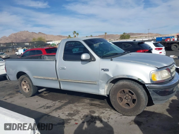 1997 Ford F-150 with VIN 1FTEF17W3VLA19510, listed as a IAAI auction lot 41711010 with 214,984 mi miles and . Bid and sale history available at DreamBid. Image 13.