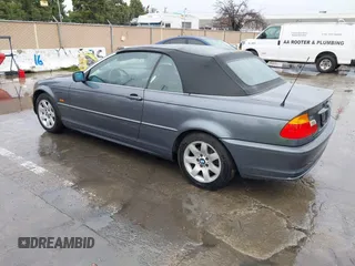 2001 BMW 3 Series 325Ci with VIN WBABS33431JY41788, listed as a IAAI auction lot 41557645 with 199,732 mi miles. Bid and sale history available at carsss.com. Image 3.