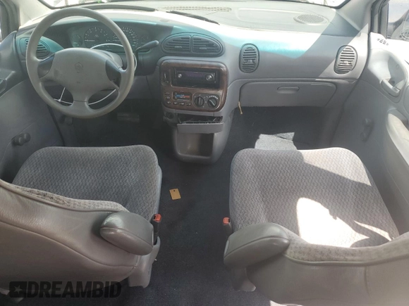1999 Plymouth Voyager z VIN 2P4FP25B1XR160654, wystawiony jako Copart lot #65941174 z przebiegiem Nie podano mil oraz Szkody całkowita. Historia ofert i sprzedaży dostępna na DreamBid. Obrazek 8.