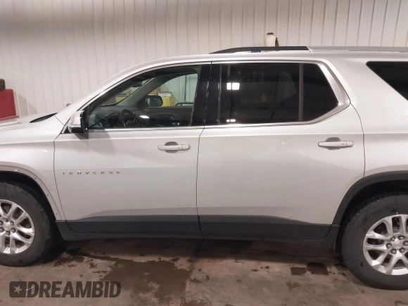 2018 Chevrolet Traverse LT Cloth z VIN 1GNEVGKW9JJ144070, wystawiony jako IAAI lot #42118002 z przebiegiem 142 006 mil mil oraz . Historia ofert i sprzedaży dostępna na DreamBid. Obrazek 15.