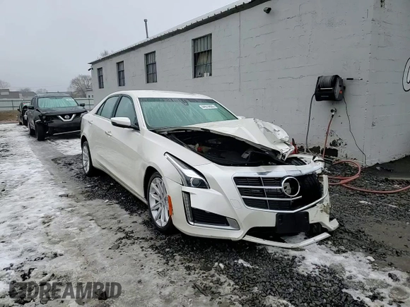 2014 Cadillac CTS AWD z VIN 1G6AW5SX0E0124225, wystawiony jako Copart lot #44914805 z przebiegiem Nie podano mil oraz Szkoda całkowita • Salvage title. Historia ofert i sprzedaży dostępna na DreamBid. Obrazek 13.