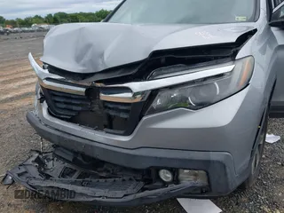 2017 Honda Ridgeline RTL with VIN 5FPYK3F52HB019266, listed as a IAAI auction lot 42638081 with 117,004 mi miles and . Bid and sale history available at DreamBid. Image 6.