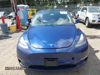 2024 Tesla Model Y Long Range z VIN 7SAYGAEE0RF074822, wystawiony jako IAAI lot #42098821 z przebiegiem Nie podano mil oraz . Historia ofert i sprzedaży dostępna na DreamBid. Obrazek 12.