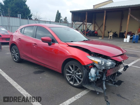 2018 Mazda 3 Touring with VIN 3MZBN1L33JM187560, listed as a IAAI auction lot 41692954 with 58,396 mi miles. Bid and sale history available at carsss.com. Image 1.