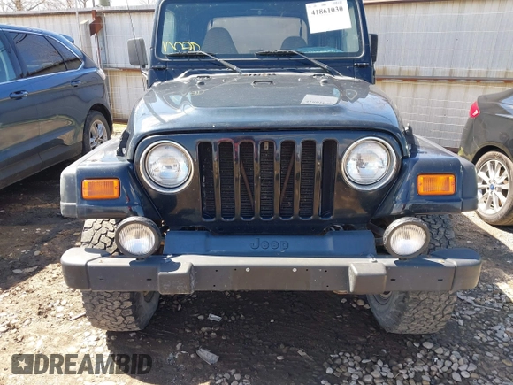 2000 Jeep Wrangler Sport with VIN 1J4FA49S8YP749547, listed as a IAAI auction lot 41861030 with 110,186 mi miles and . Bid and sale history available at DreamBid. Image 12.