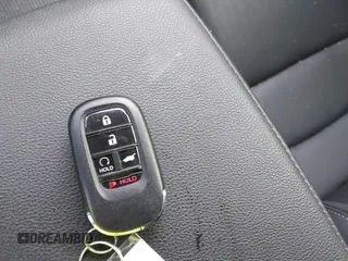 2023 Honda Civic EX-L with VIN 19XFL1H70PE014510, listed as a IAAI auction lot 42395890 with 14,163 mi miles and . Bid and sale history available at DreamBid. Image 11.