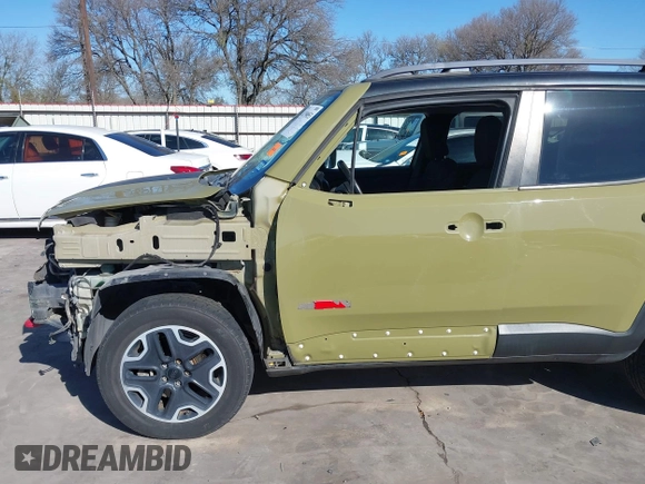 2015 Jeep Renegade Trailhawk with VIN ZACCJBCT6FPC11721, listed as a IAAI auction lot 41759053 with 95,499 mi miles and . Bid and sale history available at DreamBid. Image 19.