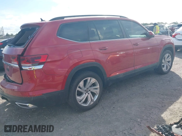 2021 Volkswagen Atlas SE z VIN 1V2WR2CA3MC526612, wystawiony jako IAAI lot #41625077 z przebiegiem 70 856 mil mil oraz . Historia ofert i sprzedaży dostępna na DreamBid. Obrazek 4.