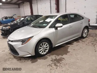 2021 Toyota Corolla LE with VIN 5YFVPMAE2MP233957, listed as a IAAI auction lot 41941056 with 49,256 mi miles. Bid and sale history available at carsss.com. Image 2.