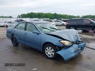 2002 Toyota Camry LE z VIN 4T1BE32KX2U617732, wystawiony jako IAAI lot #42208913 z przebiegiem Nie podano mil oraz . Historia ofert i sprzedaży dostępna na DreamBid. Obrazek 1.