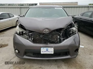 2014 Toyota Sienna SE с VIN 5TDXK3DC1ES519741, выставлен на аукционе Copart как лот 53892035 с пробегом Не указан миль и Списание • Salvage title. История ставок и продаж доступна на DreamBid. Изображение 5.