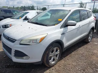 2013 Ford Escape SE with VIN 1FMCU9GX8DUA11623, listed as a IAAI auction lot 42453427 with 157,487 mi miles and . Bid and sale history available at DreamBid. Image 2.