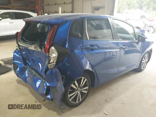 2015 Honda Fit EX-L z VIN 3HGGK5H82FM754220, wystawiony jako IAAI lot #42570240 z przebiegiem Nie podano mil oraz . Historia ofert i sprzedaży dostępna na DreamBid. Obrazek 4.